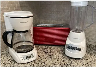 two appliances sitting on a counter next to a blender at Welcoming 4 BR Sleeps 10 Guests WL2901 in Kissimmee