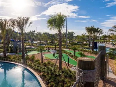 a view of a golf course at a resort at Tranquility at Storey Lake by Shine Villas #828 apts in Kissimmee