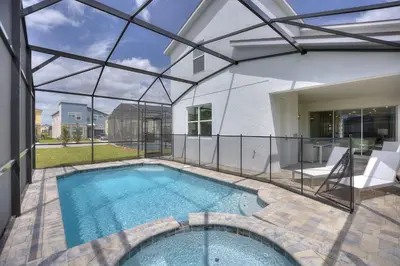 a swimming pool in a house with a glass ceiling at Sea Shore at Solara Resort by Shine Villas #401 villa in Orlando