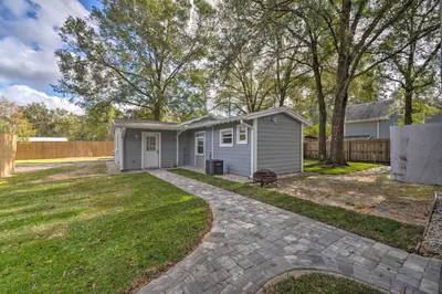a home with a small shed in a yard at Apopka Getaway with Yard and Covered Patio in Apopka