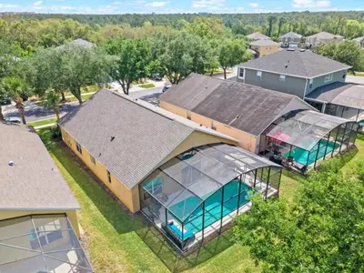 an aerial view of a house with a swimming pool at Sunshine Villa villa in Kissimmee