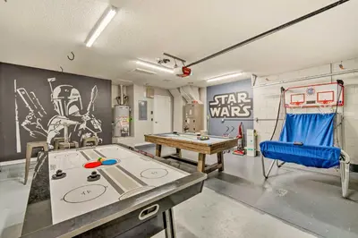a game room with a ping pong table and a ping pong table at Clermont Vacation Rental with Pool 11 Mi to Disney in Orlando