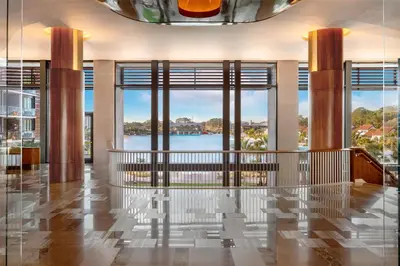 a lobby with a view of the water at Conrad Orlando in Orlando