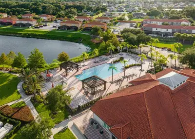 an aerial view of a resort with a swimming pool at 6BR Luxury Home w Pool Hot Tub and Games room in Kissimmee