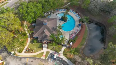 an overhead view of a swimming pool at a resort at Amazing 3 bedrooms At Lucaya- 7 miles from Disney in Kissimmee