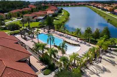 an overhead view of a swimming pool at a resort at 8BR Resort Home with Games Room and BBQ in Kissimmee