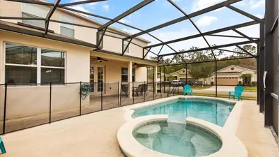a swimming pool with a pergola and a house at Shvcc2 - Crystal Cove #2 - 7 Bed 45 Baths Villa in Kissimmee