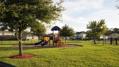 a playground with a slide in a park at Shvcc1 - Crystal Cove #1 - 7 Bed 45 Baths Villa in Kissimmee