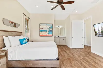 a bedroom with a bed and a ceiling fan at 3000 Latitude Lane in Orlando