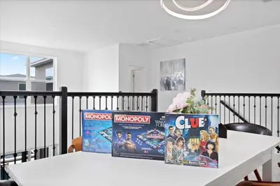 a video game box sitting on top of a table at Modern Resort House Pool Wi-Fi Minutes to Disney in Kissimmee