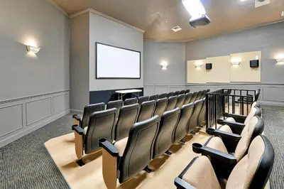 a lecture room with chairs and a projection screen at Mickey's Hideaway Windsor Hills Resort in Orlando