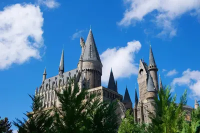 a castle with turrets and spires on a blue sky at 4552 Bella Vida 2 in Kissimmee