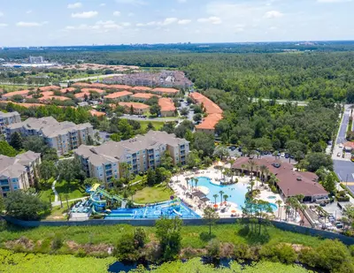 an aerial view of a resort with a pool at Charming 3BR Townhome Private Pool Walk to Clubhouse 9 Min Disney in Orlando