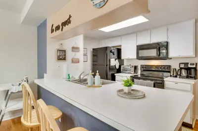 a kitchen with a sink and a counter top at Condo with Pool Access and Patio 8 Mi to Disney! in Kissimmee
